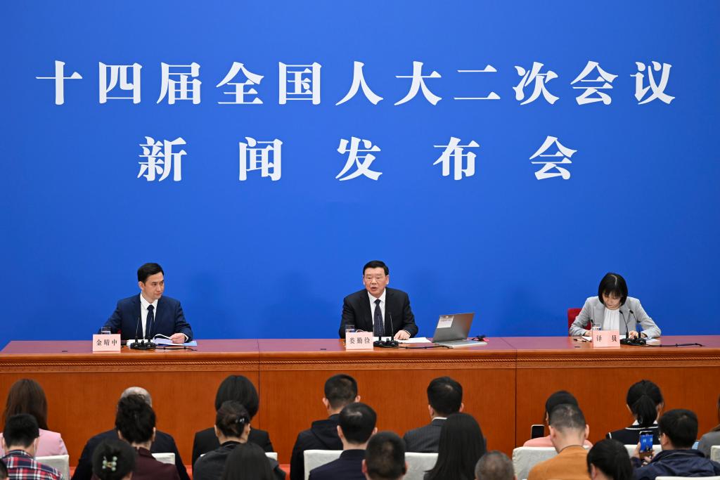 3月4日，十四屆全國人大二次會議在北京人民大會堂舉行新聞發(fā)布會。大會發(fā)言人婁勤儉就大會議程和人大工作相關(guān)問題回答中外記者的提問。 新華社記者 牟宇 攝
