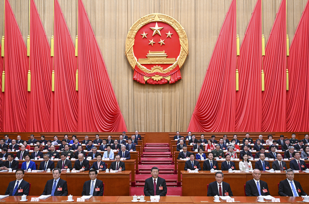 3月5日，第十四屆全國人民代表大會第二次會議在北京人民大會堂開幕。黨和國家領(lǐng)導(dǎo)人習(xí)近平、李強(qiáng)、王滬寧、蔡奇、丁薛祥、李希、韓正等出席大會。新華社記者 李學(xué)仁 攝