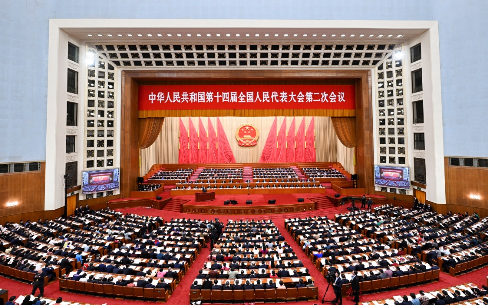 3月8日，十四屆全國人大二次會議在北京人民大會堂舉行第二次全體會議。 新華社記者 張領(lǐng) 攝