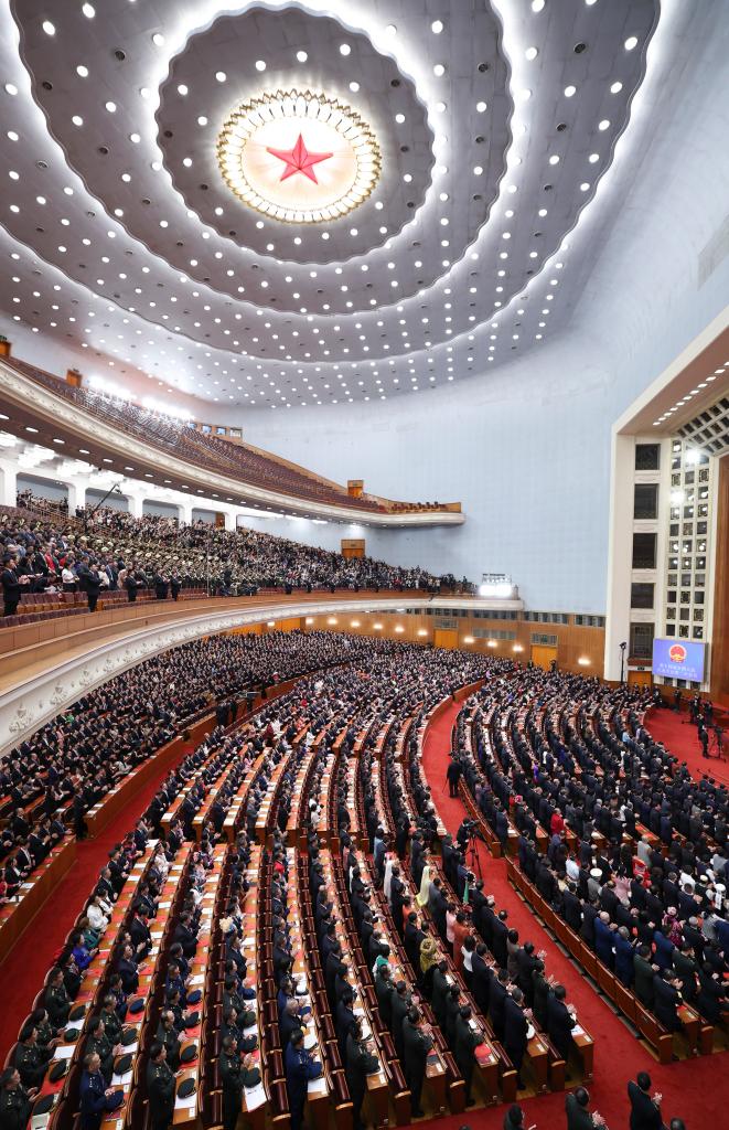 3月11日，第十四屆全國人民代表大會第二次會議在北京人民大會堂舉行閉幕會。新華社記者 丁林 攝