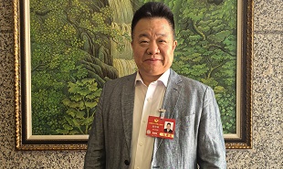 全國政協(xié)常委，中國作協(xié)副主席邱華棟